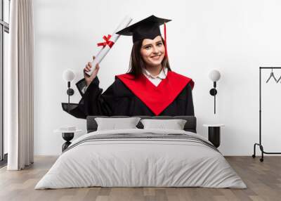 Happy graduated student girl with scroll isolated on white background Wall mural